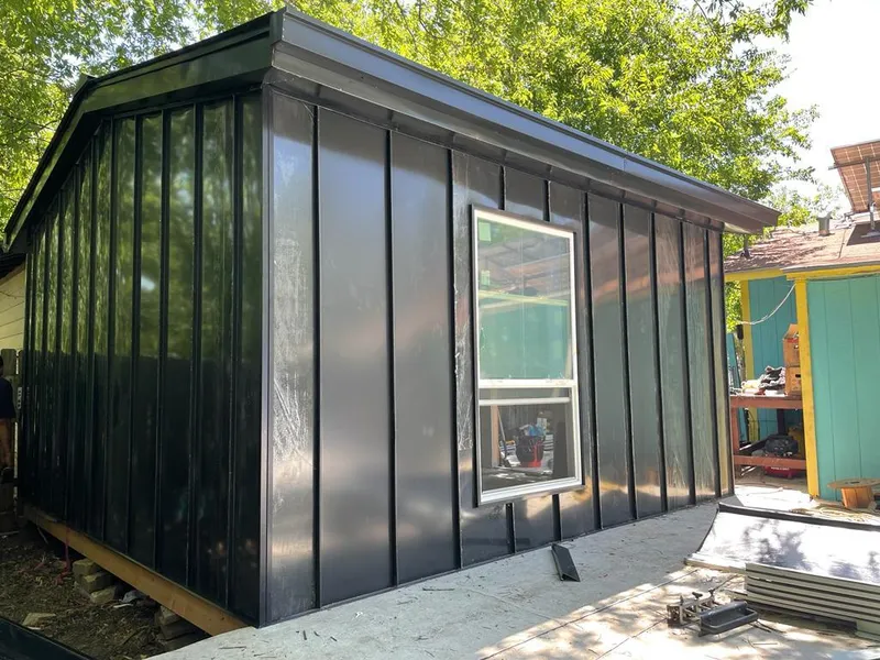 Black standing seam metal wall panels for Metal Roof Installation in Fort Rucker